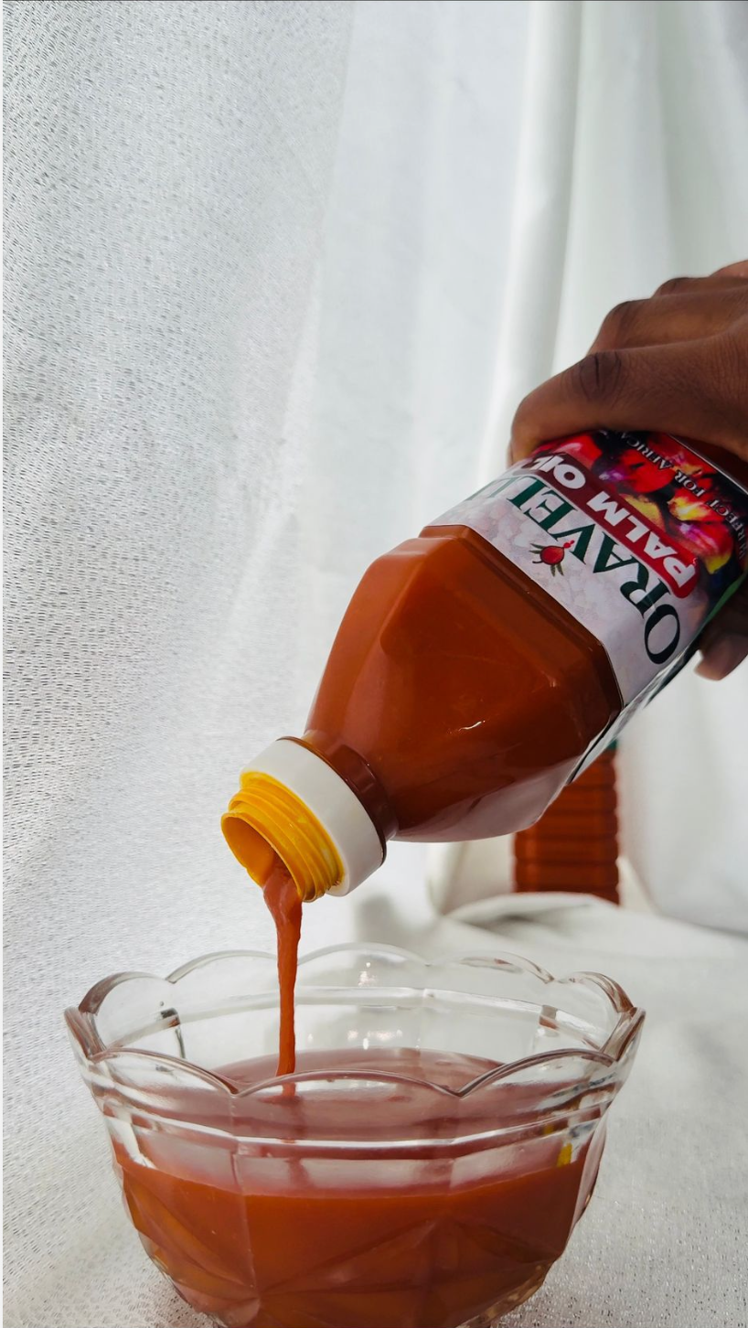 Palm oil pouring into a bowl